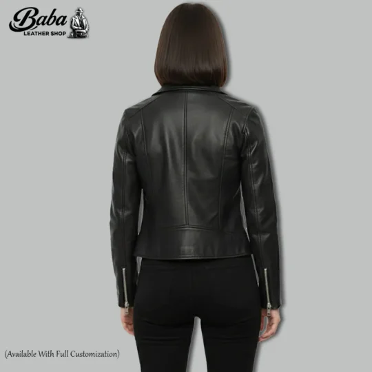Back view of a women's black zippered MOTO leather jacket showing panel stitching and cut