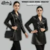 Woman's double breasted leather coat in black with structured lapels and polished front buttons