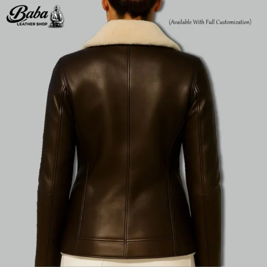 Back view of womens shearling aviator jacket displaying full leather construction and shearling lining detail