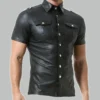 Man wearing a button up leather shirt in a confident left-side pose, styled casually
