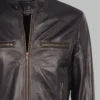 Close-up of Black Classic Leather Jacket zipper, stitching, and leather grain