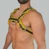 Side angle of black leather harness for men styled over a fitted top