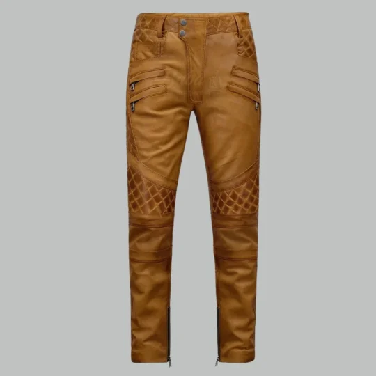Burnt orange leather pants for men, front view, with diamond quilted knees, zipper pockets and ankle zippers