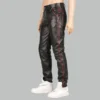 Mens black leather jeans with red piping along the side seam and pockets, side view on mannequin with white sneakers
