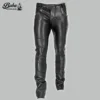 Soft black leather pants for men, front view, with paneled knee stitching and a zip fly